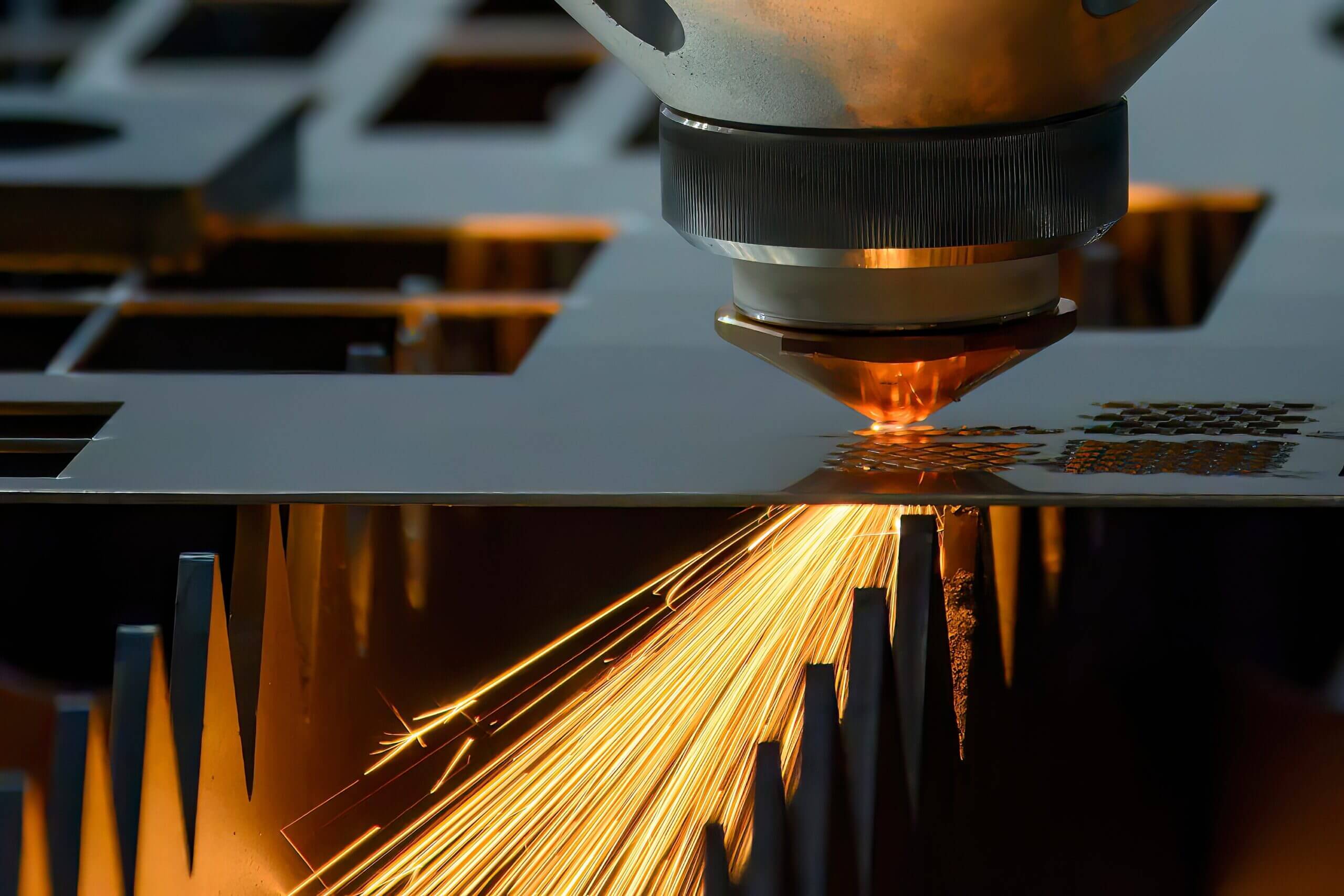 Fiber laser cutting metal with sparks