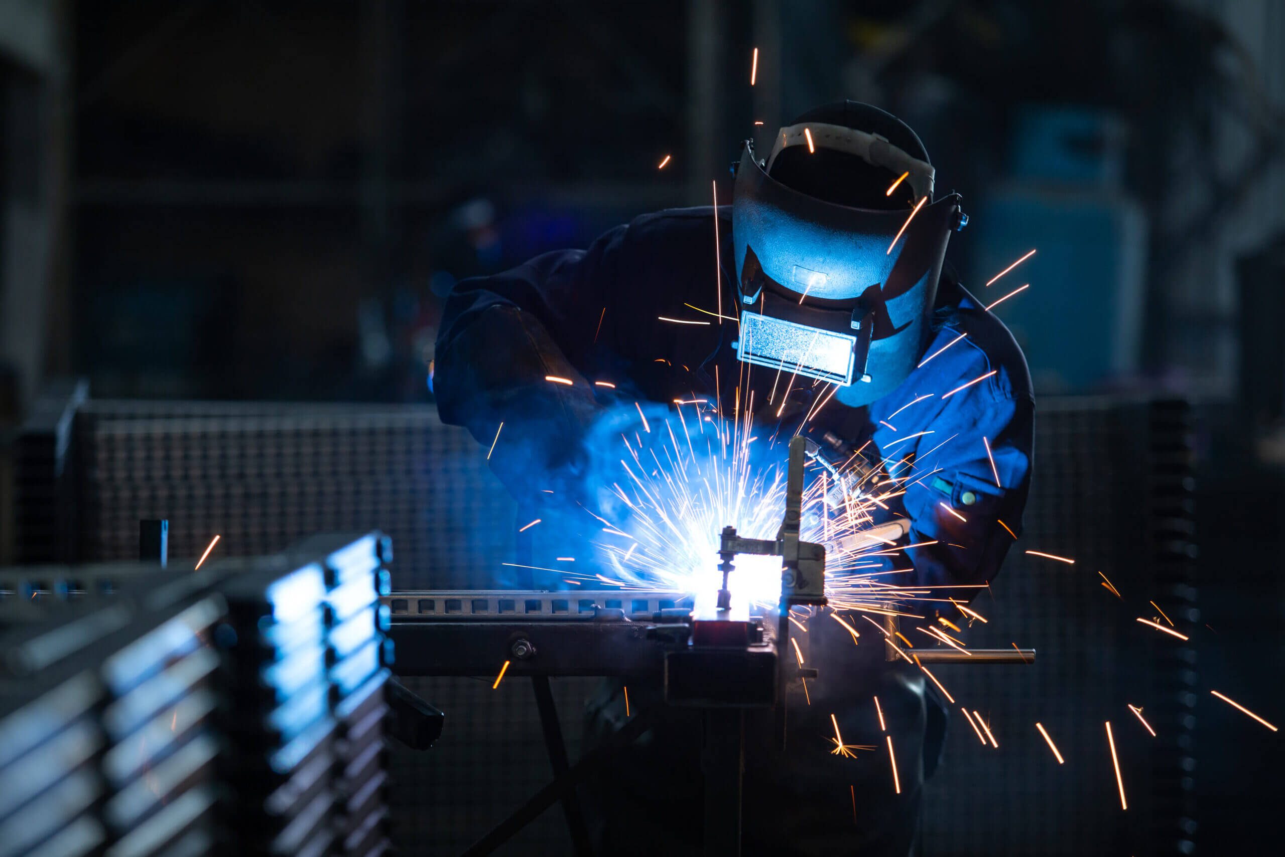 Welder working with sparks